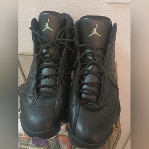 Jordan Black Leather High-Top Sneakers with Gold Jumpman